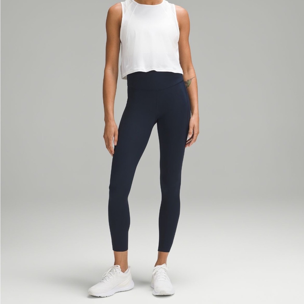 Lululemon fast and free tight 25” in true navy, size 4